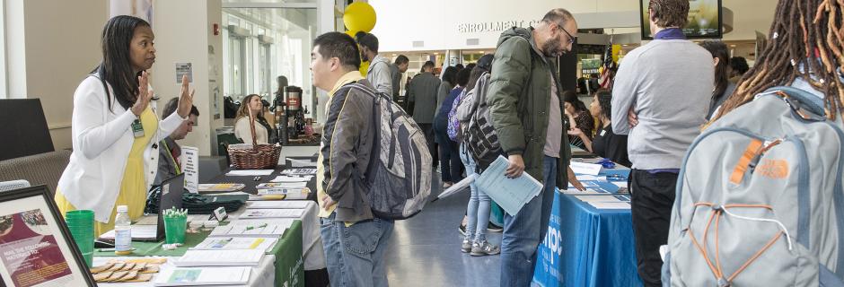 CCP student talking about programs at an event.