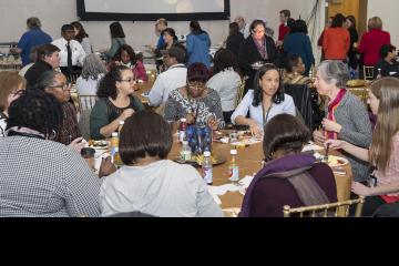 Faculty and staff mingle and enjoy brunch