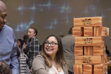 Attendees play giant Jenga