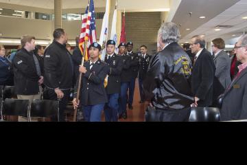 The Color Guard carries the flags to begin the ceremony.
