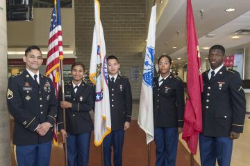 The Color Guard smiles for the camera.