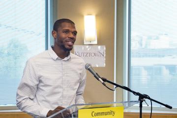 Fred Dukes IV, a student of Community College of Philadelphia and Kutztown University speaks to the audience.