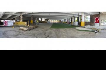 A panoramic view of the demolition party site before the party set up.