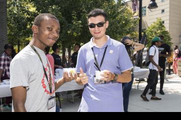 Two students pose with their ice cream.