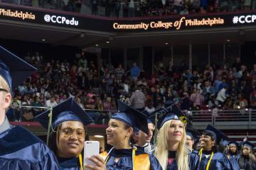 Graduates march into the arena.