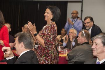 Judy Gay and the audience give the keynote speaker, Ms. Borges Carrera, a standing ovation.